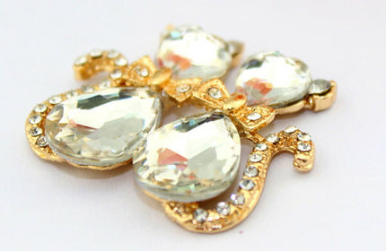 メタルデコパーツ ・リボン　キラキラ・猫・ネコ・ハンドメイドパーツ・アクセサリー・デコパーツ ・デコ電パーツ・1個・金属カメリアパーツ